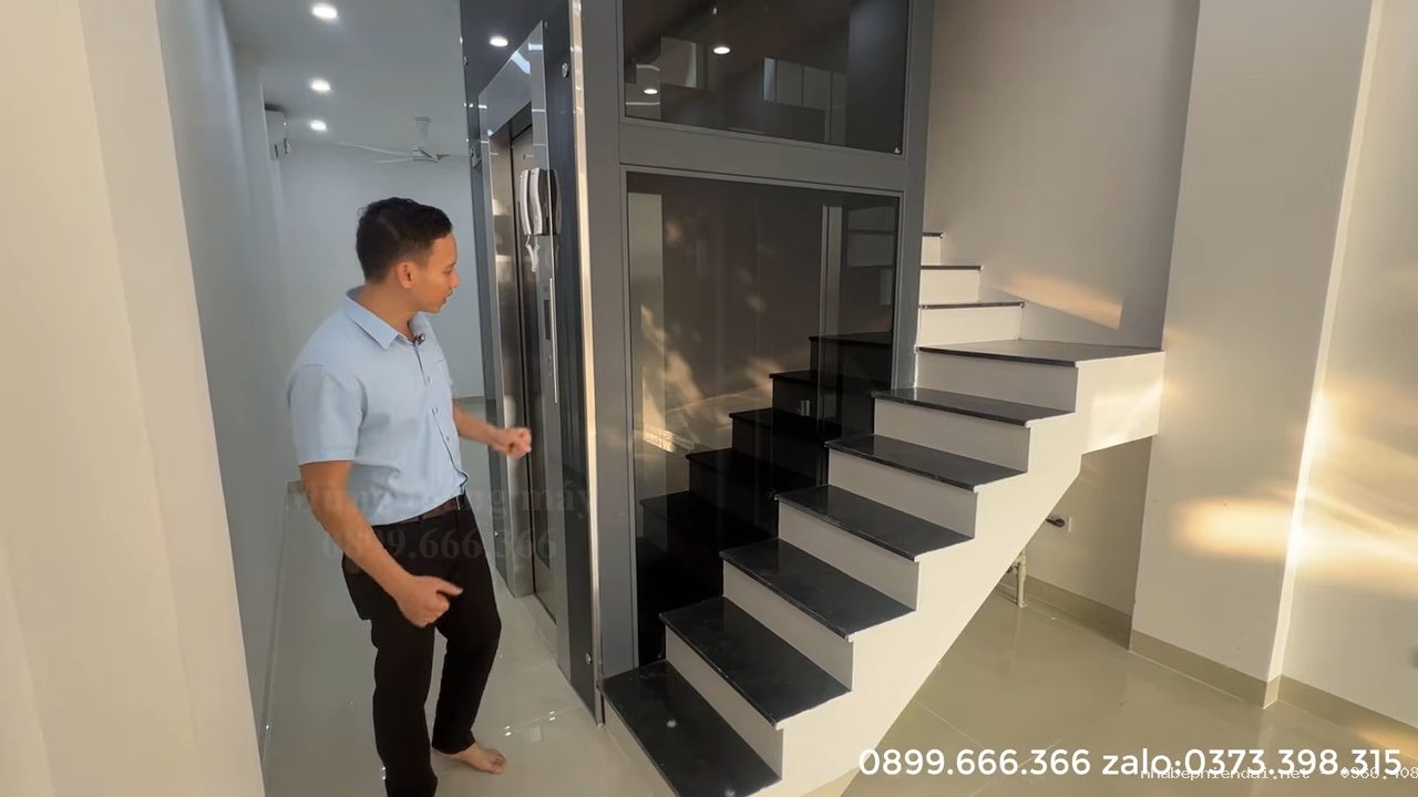 Thang máy gia đình khung thép vách kính 350 kg cho nhà ống 2 phòng mỗi tầng tại Châu Quỳ Hà Nội - Hình 6 Thang máy gia đình khung thép vách kính 350 kg cho nhà ống 2 phòng mỗi tầng tại Châu Quỳ Hà Nội - Hình 6