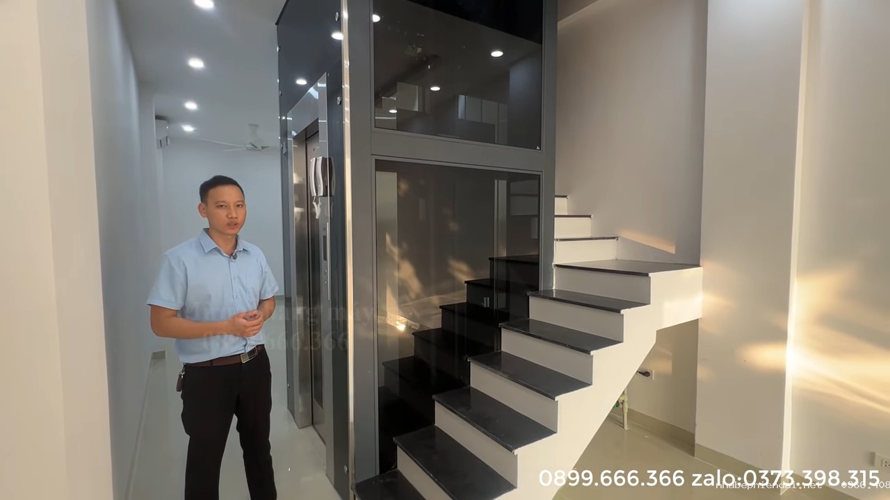 Thang máy gia đình khung thép vách kính 350 kg cho nhà ống 2 phòng mỗi tầng tại Châu Quỳ Hà Nội - Hình 23 Thang máy gia đình khung thép vách kính 350 kg cho nhà ống 2 phòng mỗi tầng tại Châu Quỳ Hà Nội - Hình 23