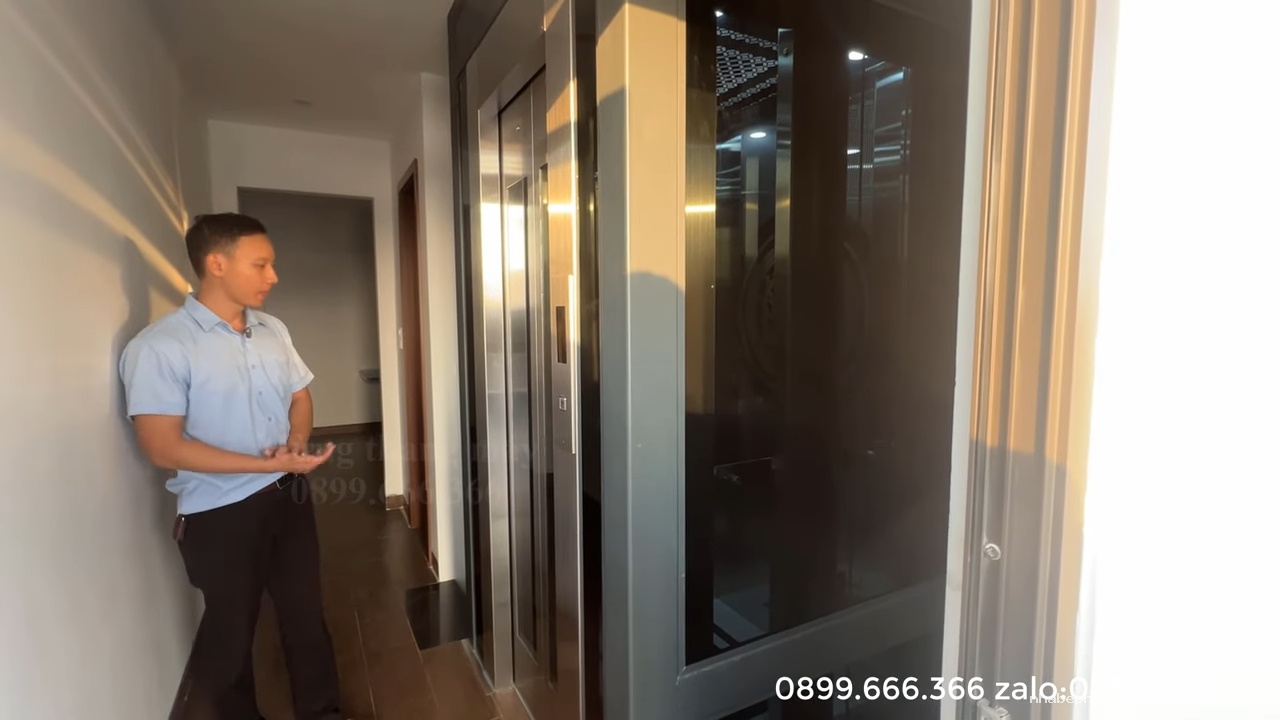 Thang máy gia đình khung thép vách kính 350 kg cho nhà ống 2 phòng mỗi tầng tại Châu Quỳ Hà Nội - Hình 19 Thang máy gia đình khung thép vách kính 350 kg cho nhà ống 2 phòng mỗi tầng tại Châu Quỳ Hà Nội - Hình 19