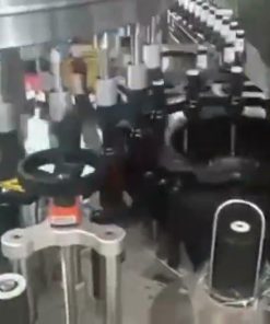 Máy dán nhãn chai bia