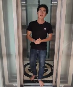 Thang máy vách kính inox gương vàng - chi tiết máy 6