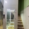 Dòng thang máy mini gia đình tận dụng giếng trời