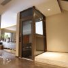 Top 4 Mẫu Thang Máy Mini Vách Kính - Ít Phải Sửa Nhà Nhất